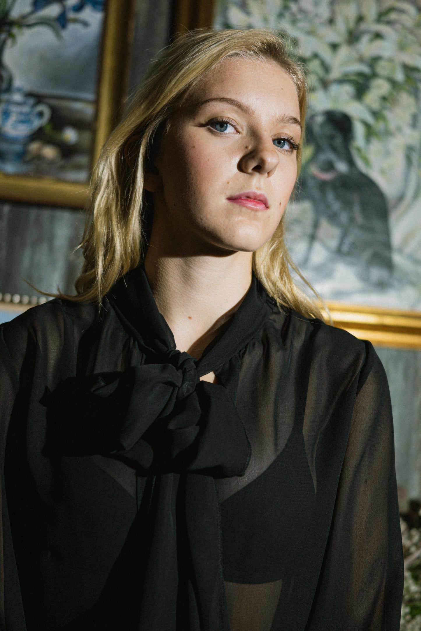 A silk blouse with charming bow