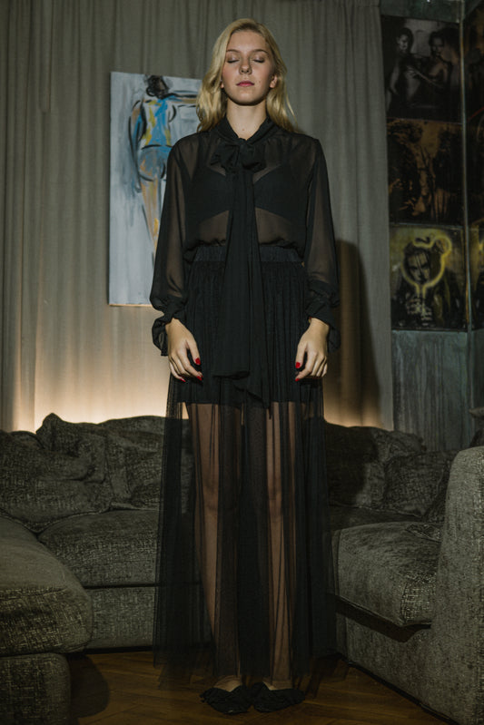 A silk blouse with charming bow